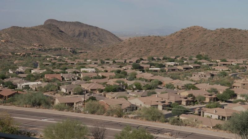 NextImg:Scottsdale bans natural grass in front yards of new houses to conserve water amid Arizona's drought | CNN