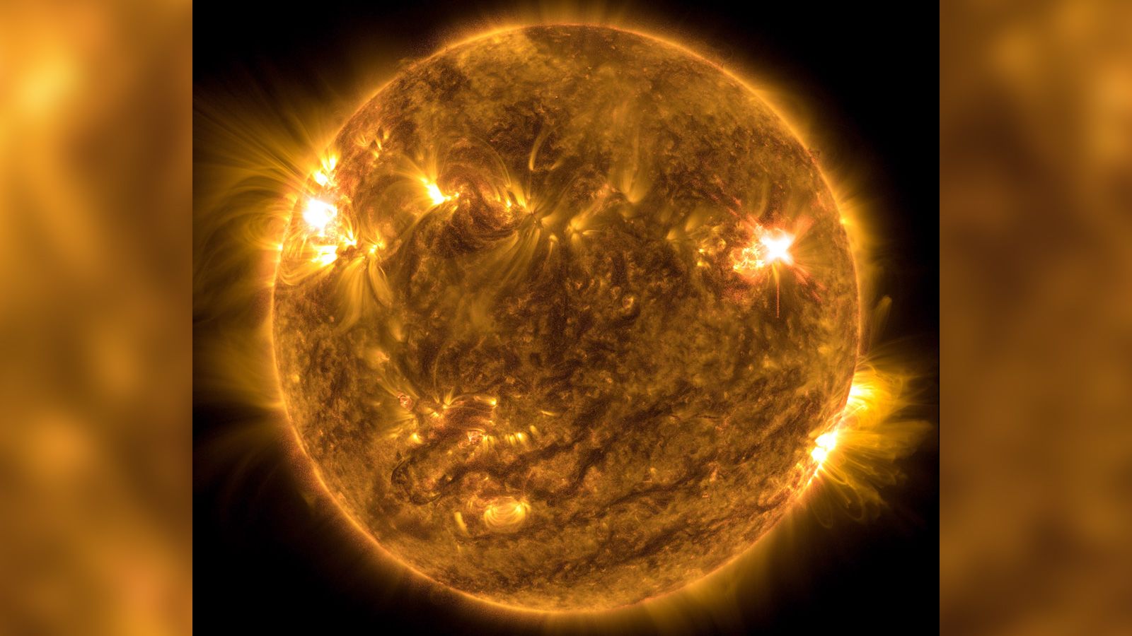 Sun throws out strongest explosion in years on a day full of solar flares