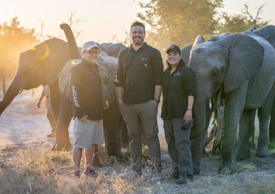 The foundation is partnering with Colossal on an extensive data-gathering operation, using artificial intelligence (AI) to analyze the animals' behavior and pair it with genomic data on each elephant. "We'll be able to mix the art of the elephant handlers with the science of today," argues Matt James, chief animal officer at Colossal (pictured center).