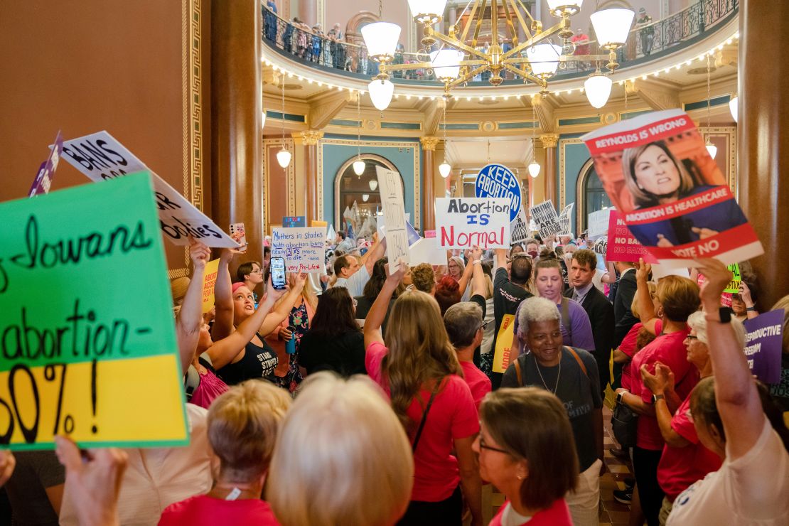 Protestors fill the Iowa State Capitol rotunda, as the Iowa Legislature convenes for special session to pass 6-week 'fetal heartbeat' abortion ban Tuesday, July 11, 2023. 