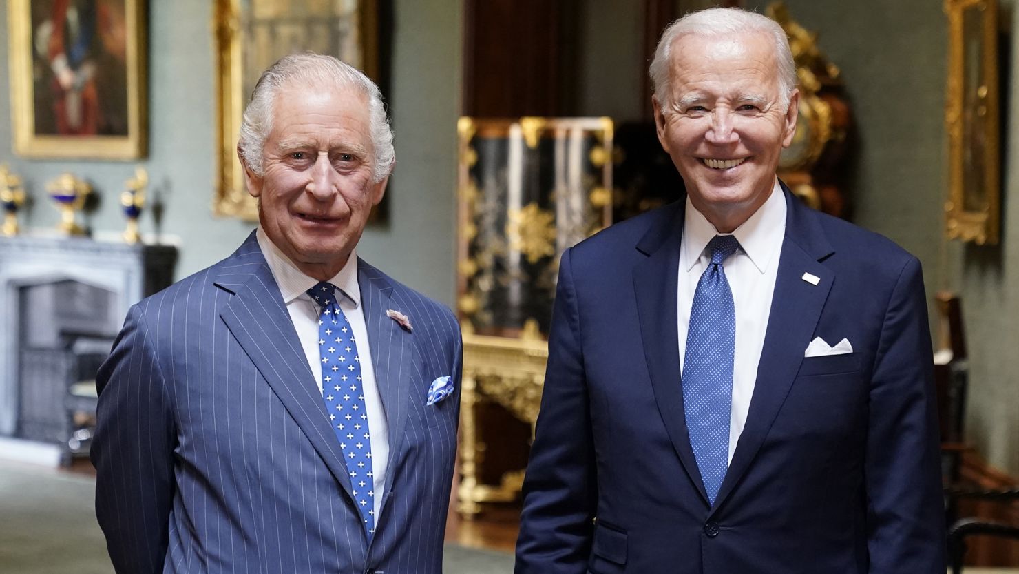 King Charles III and US President Joe Biden pose in the Grand Corridor at Windsor Castle on July 10, 2023.