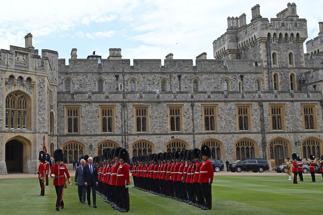 The pair inspect an honor guard formed by the Welsh Guards, during a ceremonial welcome in the Quadrangle at the royal residence. 
