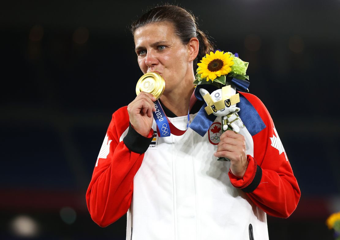 Christine Sinclair poses with her gold medal after Canada had won women's football competition at the Tokyo 2020 Olympic Games.