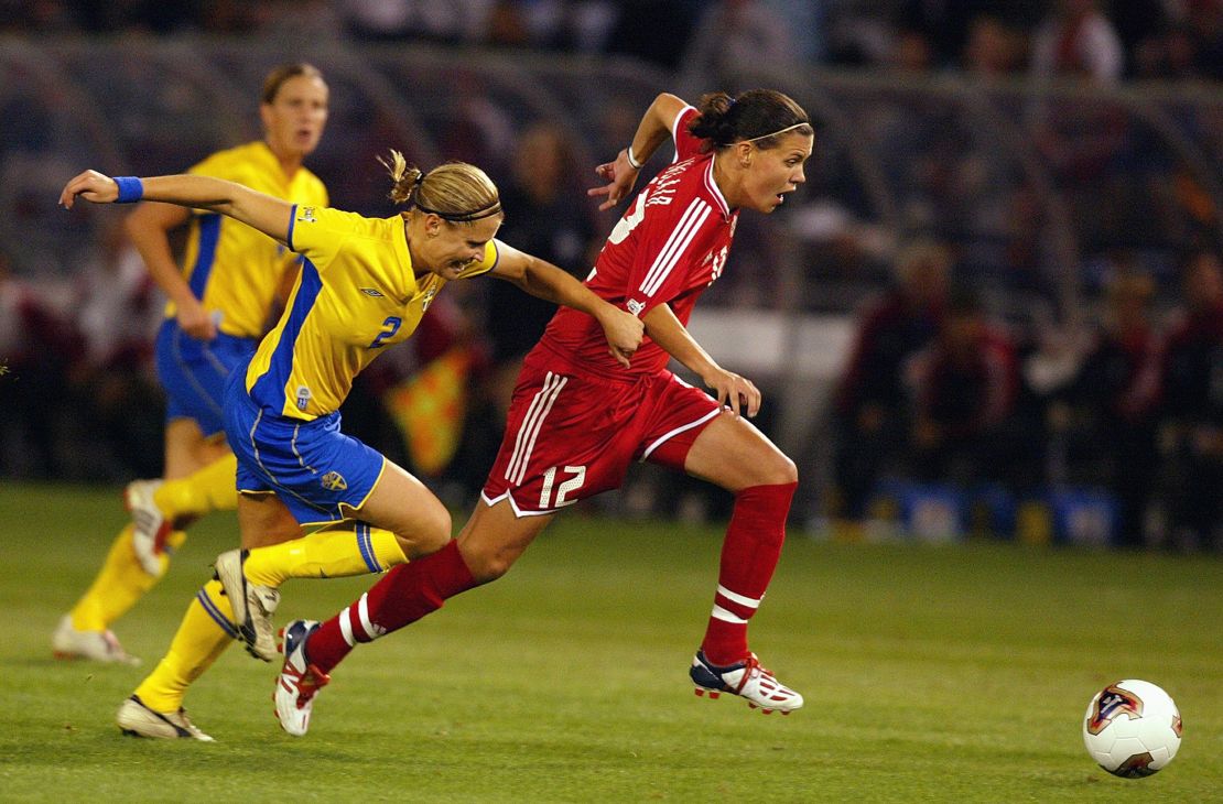 PORTLAND, OR - OCTOBER 5:  Christine Sinclair #12 of Canada dribbles against the defense of Karolina Westberg #2 of Sweden during the semifinals of the FIFA Women's World Cup  match on October 5, 2003 at PGE Park in Portland, Oregon. (Photo by Ben Radford/Getty Images)