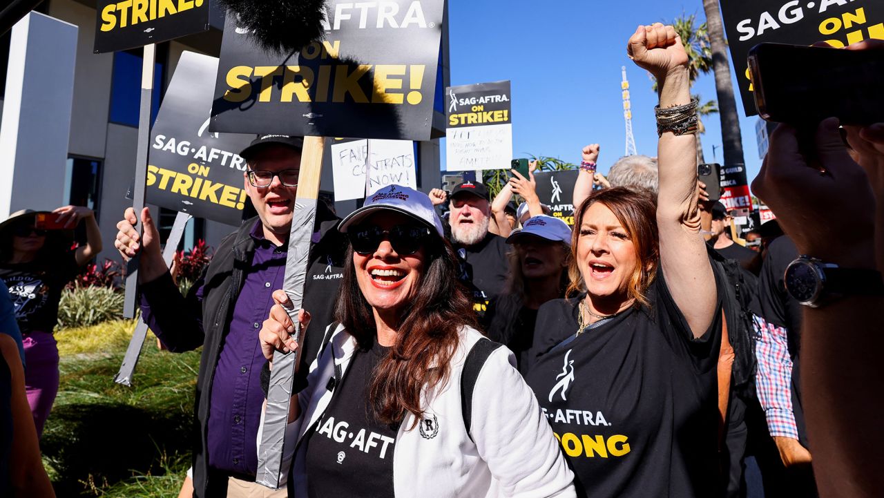 SAG-AFTRA union President Fran Drescher and Duncan Crabtree-Ireland, SAG-AFTRA National Executive Director and Chief Negotiator, demonstrate as SAG-AFTRA actors join the Writers Guild of America (WGA) in a strike against the Hollywood studios, on the picket like outside of Netflix offices in Los Angeles, California, U.S., July 14, 2023.