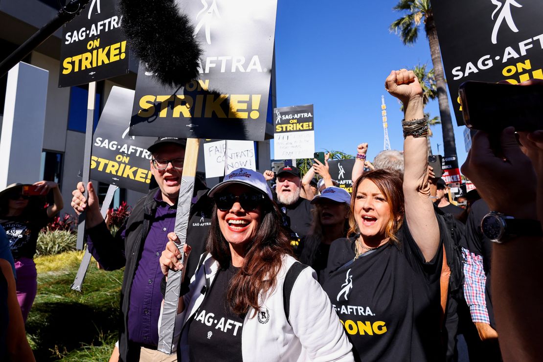 SAG-AFTRA union President Fran Drescher and Duncan Crabtree-Ireland, SAG-AFTRA National Executive Director and Chief Negotiator, demonstrate as SAG-AFTRA actors join the Writers Guild of America (WGA) in a strike against the Hollywood studios, on the picket like outside of Netflix offices in Los Angeles, California, U.S., July 14, 2023.   