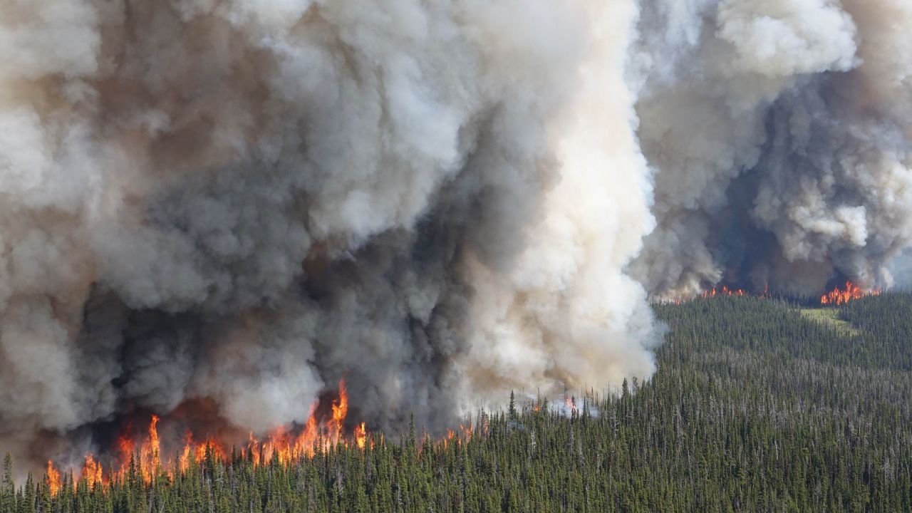 An out-of-control fire burns 60 miles southeast of Kamloops, British Columbia, on Wednesday, July 12, 2023.