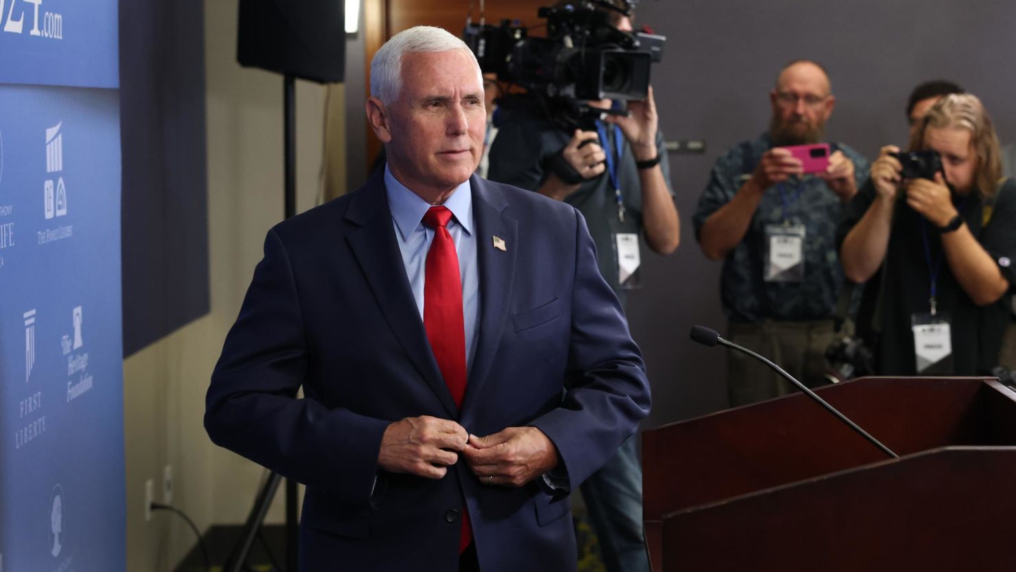 Republican presidential candidate Mike Pence speaks to the press after addressing guests at the Family Leadership Summit in Des Moines, Iowa, on July 14, 2023.