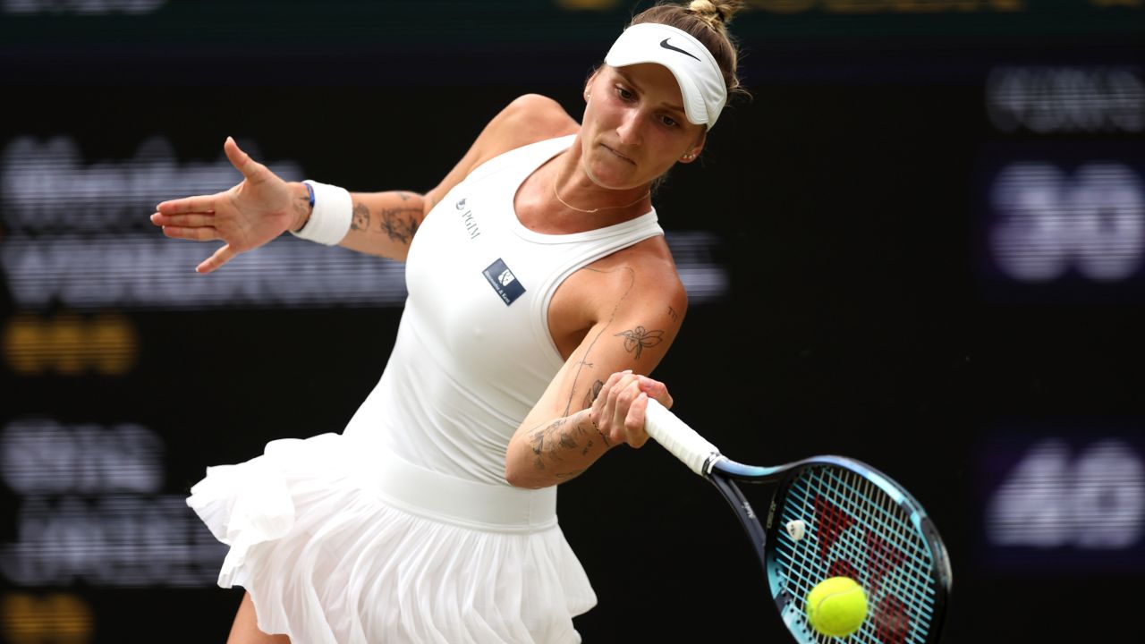 Marketa Vondrusova of the Czech Republic serves a forehand during the women's singles final against Ons Jaber of Tunisia on day thirteen of the Championships Wimbledon 2023 at the All England Lawn Tennis and Croquet Club on July 15, 2023 in London, England.