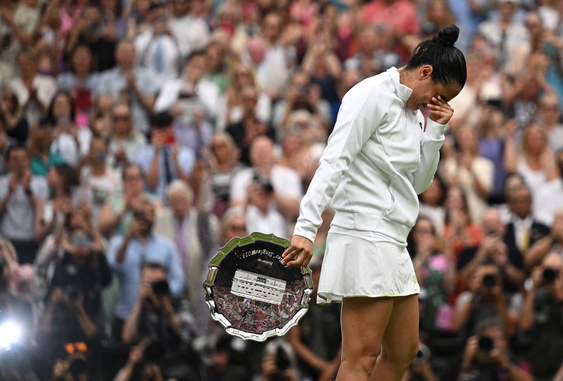 Tennis - Wimbledon - All England Lawn Tennis and Croquet Club, London, Britain - July 15, 2023
Tunisia's Ons Jabeur with the runners up trophy after losing her final match against Czech Republic's Marketa Vondrousova.