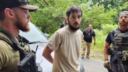 Pennsylvania escaped inmate Michael Burham has been captured without incident in a wooded area near Warren, a source with knowledge of the investigation tells CNN.
