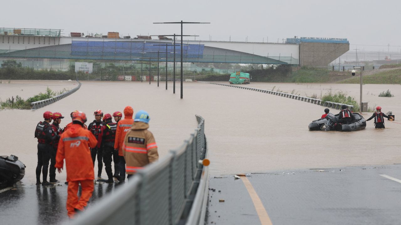 Rescue workers take part in a search and rescue operation near an underpass which is completely submerged by torrential rain in Cheongju, South Korea, July 15, 2023.    Yonhap via REUTERS   THIS IMAGE HAS BEEN SUPPLIED BY A THIRD PARTY. NO RESALES. NO ARCHIVES. SOUTH KOREA OUT. NO COMMERCIAL OR EDITORIAL SALES IN SOUTH KOREA.