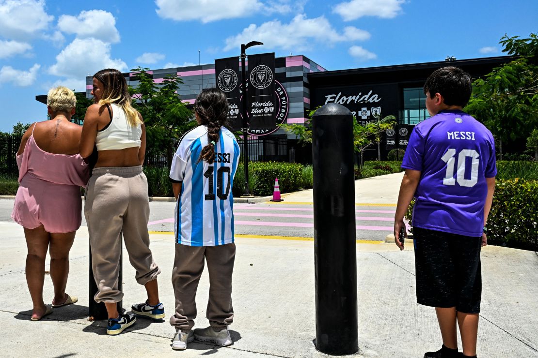 Fans of Argentine football player Lionel Messi wait for his arrival at the DRV PNK Stadium in Fort Lauderdale, Florida, on July 11, 2023, ahead of Messi's debut in the Major League Soccer (MLS) with Inter Miami. Messi landed in Florida on Tuesday ahead of putting the final touches on his move to US Major League Soccer club Inter Miami, ESPN television footage showed. Inter Miami announced July 7, 2023, it will hold a presentation event called 'The Unveil' on July 16 at its home stadium. Messi said last month that he was moving to the MLS club after allowing his contract at Paris Saint-Germain to run out.