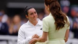 Tennis - Wimbledon - All England Lawn Tennis and Croquet Club, London, Britain - July 15, 2023
Tunisia's Ons Jabeur receives the runners up trophy from Britain's Catherine, Princess of Wales after losing her final match against Czech Republic's Marketa Vondrousova