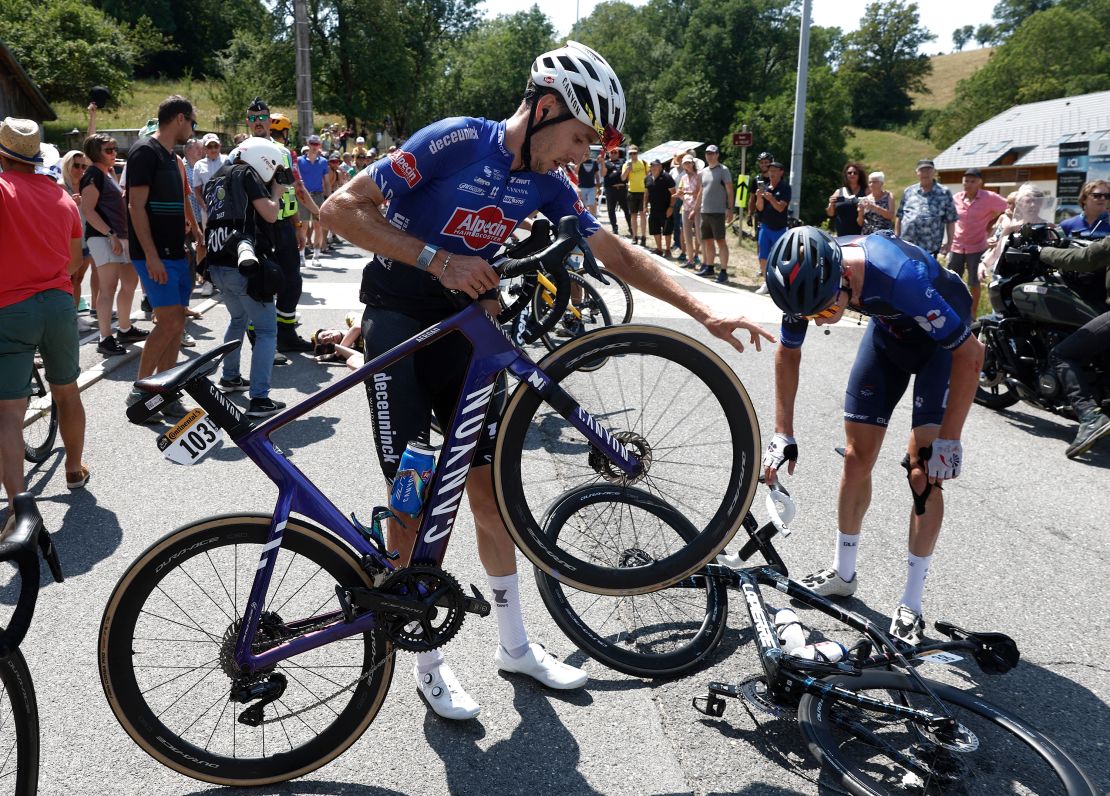 Cycling - Tour de France - Stage 15 - Les Gets Les Portes Du Soleil to Saint-Gervais Mont-Blanc - France - July 16, 2023
Alpecin--Deceuninck's Michael Gogl and Groupama--FDJ's Lars van den Berg after a crash during stage 15