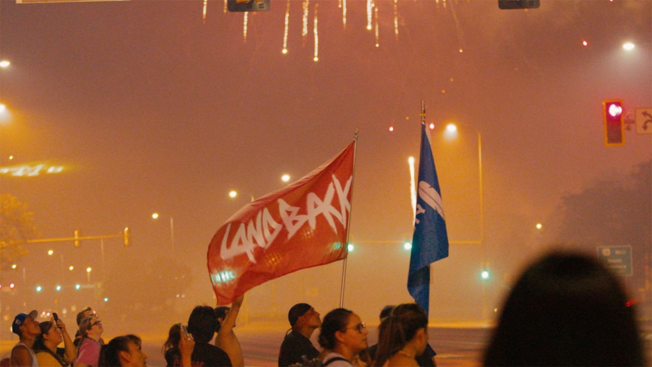 A still from the documentary "Lakota Nation vs the United States" shows protestors demanding land be returned to the Indigenous people.