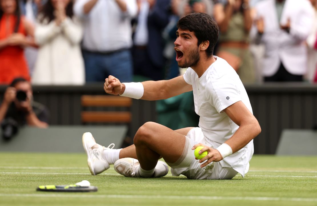 Carlos Alcaraz of Spain celebrates winning Championship Point during the Men's Singles Final against Novak Djokovic of Serbia on day fourteen of The Championships Wimbledon 2023 at All England Lawn Tennis and Croquet Club on July 16, 2023 in London, England.