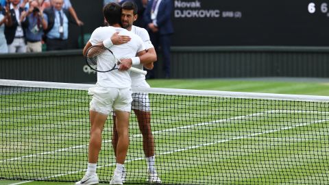 Tennis - Wimbledon - All England Lawn Tennis and Croquet Club, London, Britain - July 16, 2023
Spain's Carlos Alcaraz with Serbia's Novak Djokovic after winning the final