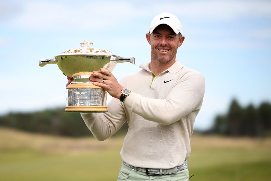 NORTH BERWICK, SCOTLAND - JULY 16: Rory McIlroy of Northern Ireland poses for a photo with the Genesis Scottish Open trophy on the 18th green after winning the tournament during Day Four of the Genesis Scottish Open at The Renaissance Club on July 16, 2023 in United Kingdom. (Photo by Jared C. Tilton/Getty Images)