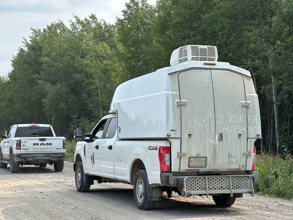 Van carries South Korean firefighters who are joining the effort to tame the wildfires.