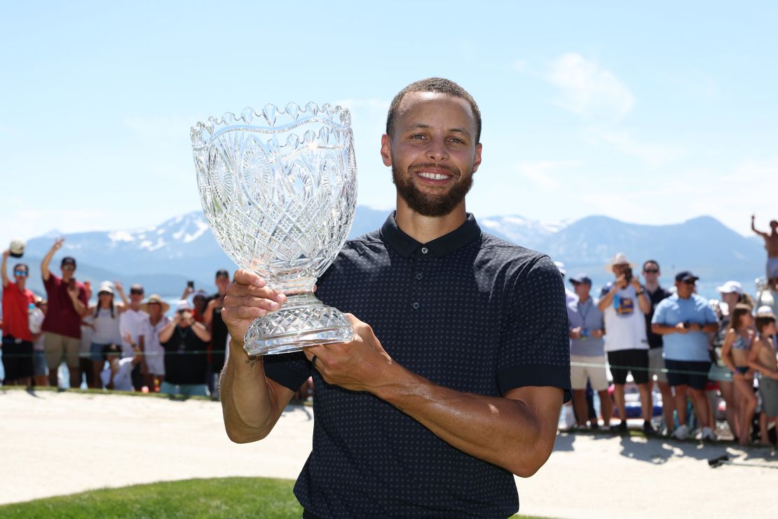 STATELINE, NEVADA - JULY 16: Stephen Curry of the NBA Golden State Warriors holds the trophy after winning the American Century Championship on Day Three of the 2023 American Century Championship at Edgewood Tahoe Golf Course on July 16, 2023 in Stateline, Nevada. (Photo by Isaiah Vazquez/Getty Images)