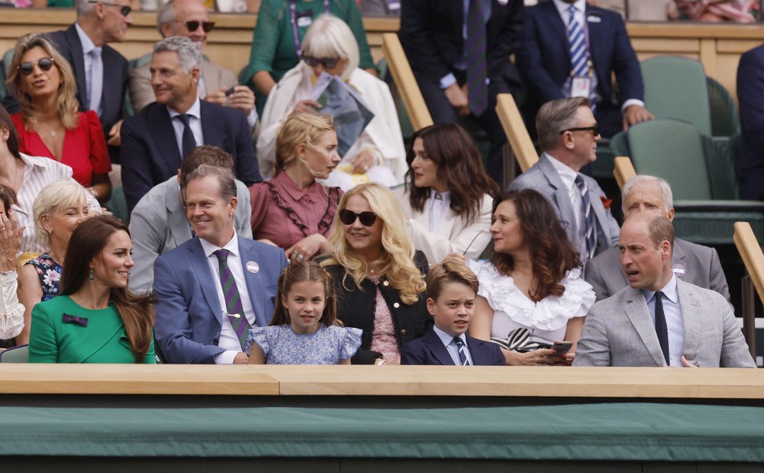 Charlotte (center left), and George (center right) sit in the Royal Box ahead of the men's singles Wimbledon final on Sunday.