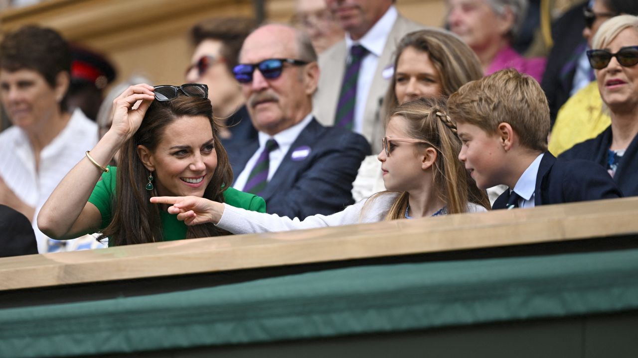 Kate (left) wore a green dress as she is accompanied by Charlotte and George for the thrilling five-set match between Carlos Alcaraz and Novak Djokovic.