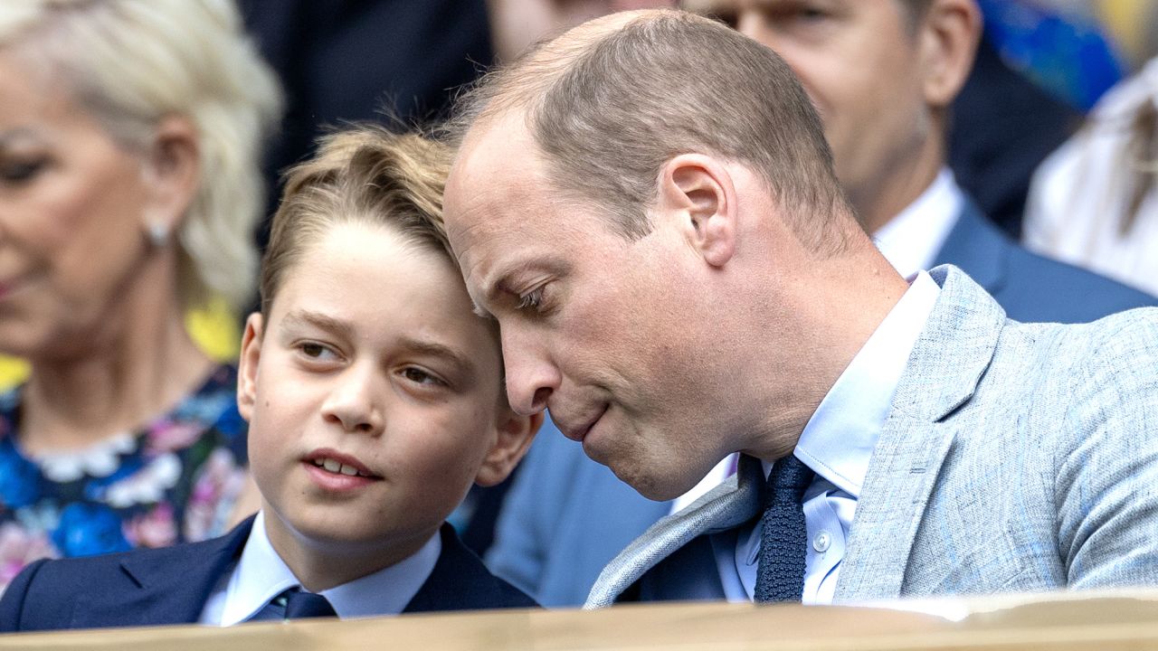 George and his father, Prince William (right), can be seen watching the tense match, which was decided in the fifth set.