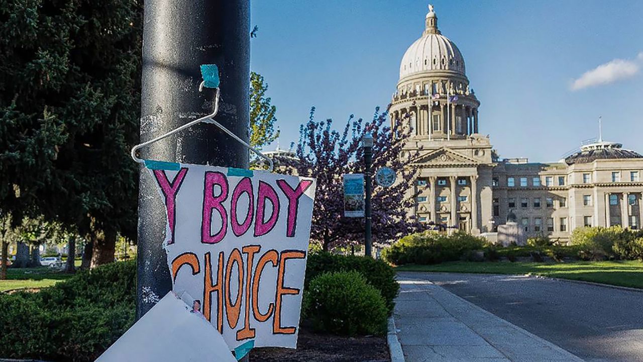 A sign taped to a hanger hangs near the Idaho Capitol in Boise after protests against the state's new abortion laws, which effectively banned the procedure. 