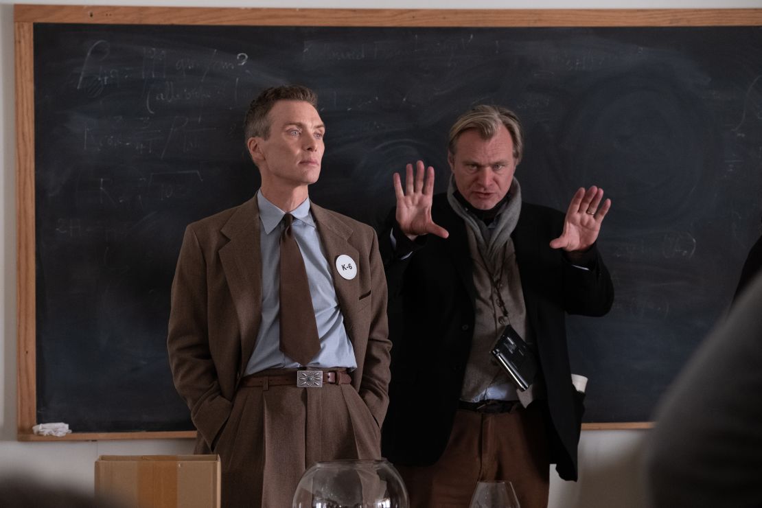 Cillian Murphy alongside Christopher Nolan on the set of "Oppenheimer."