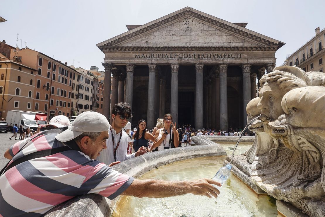 ROME, ITALY, JULY 17:
Tourists refresh at a fountain in front of the Pantheon during a sultry day in Rome, Italy, on July 17, 2023. Rome, Bologna and Florence are among the 16 Italian cities for which authorities issued hot weather red alerts, as temperatures are expected to rise in the coming days. (Photo by Riccardo De Luca/Anadolu Agency via Getty Images)