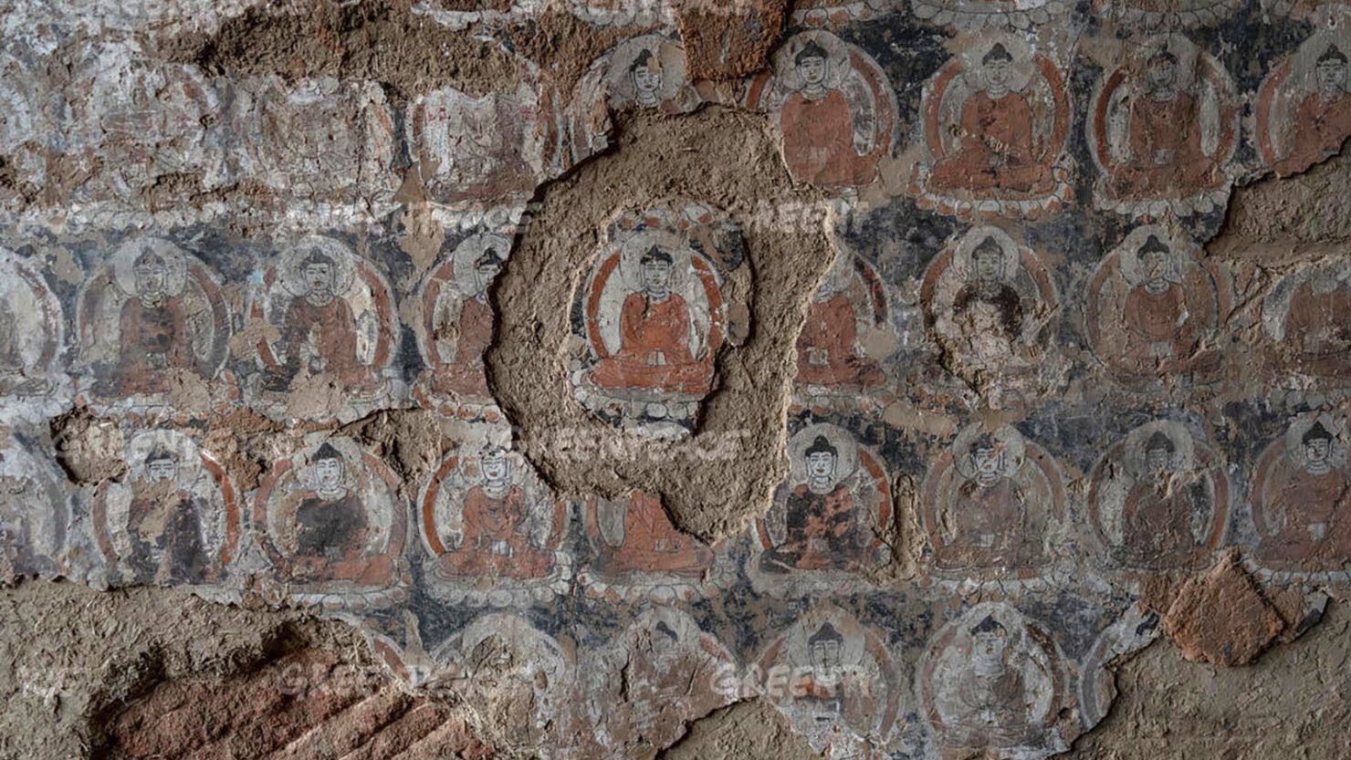 This research material provided by Greenpeace shows crumbling and detachment on a mural in the Eastern Cave of the Jinta Temple. 