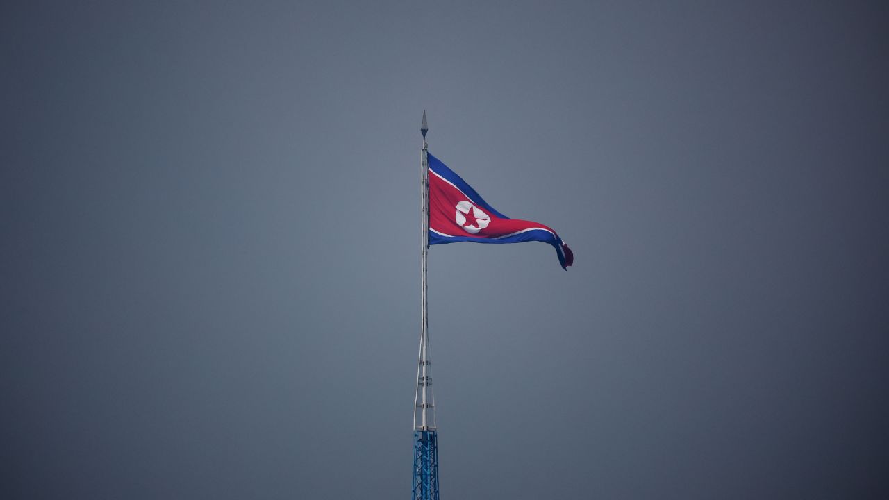 A North Korean flag flies over the propaganda village of Gijungdong in North Korea, in this picture taken near the truce village of Panmunjom inside the demilitarized zone (DMZ) separating the two Koreas, on July 19, 2022. (Photo by KIM HONG-JI / POOL / AFP) (Photo by KIM HONG-JI/POOL/AFP via Getty Images)
