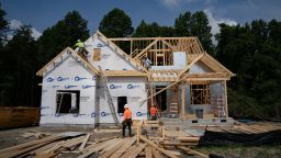 Workers build homes in Lillington, North Carolina, US, on Thursday, June 15, 2023. 