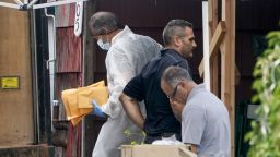 Authorities remove evidence as they search the home of suspect Rex Heuermann, Tuesday, July 18, 2023, in Massapequa Park, N.Y. Police carted more boxes of potential evidence Tuesday out of the Long Island home of Heuermann, who has been charged with killing at least three women in the long-unsolved slayings known as the Gilgo Beach killings. 