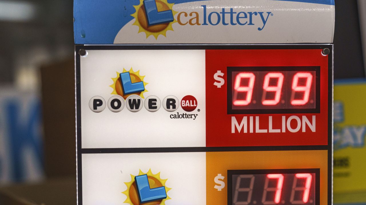 A California Lottery Powerball sign displays an amount of $999 million at Won Won Mini Market liquor store in Los Angeles on Tuesday, July 18, 2023. The Powerball jackpot rose yet again to an estimated $1 billion after no winning ticket was sold for the latest drawing. (AP Photo/Damian Dovarganes)