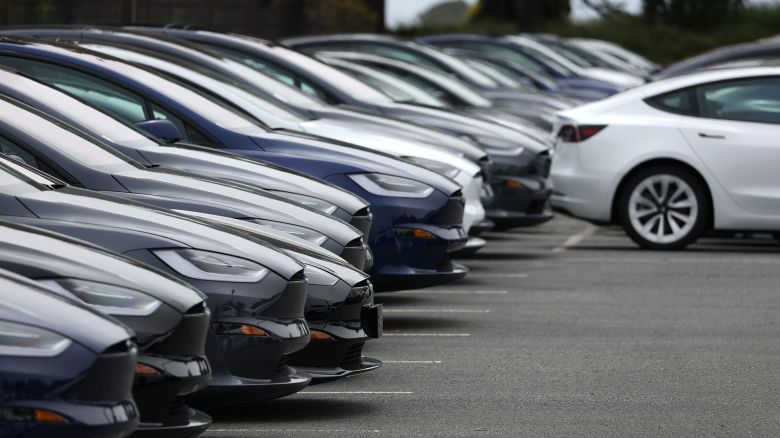 Brand new Tesla cars are displayed on the sales lot at a Tesla dealership on May 16, 2023 in Colma, California. 