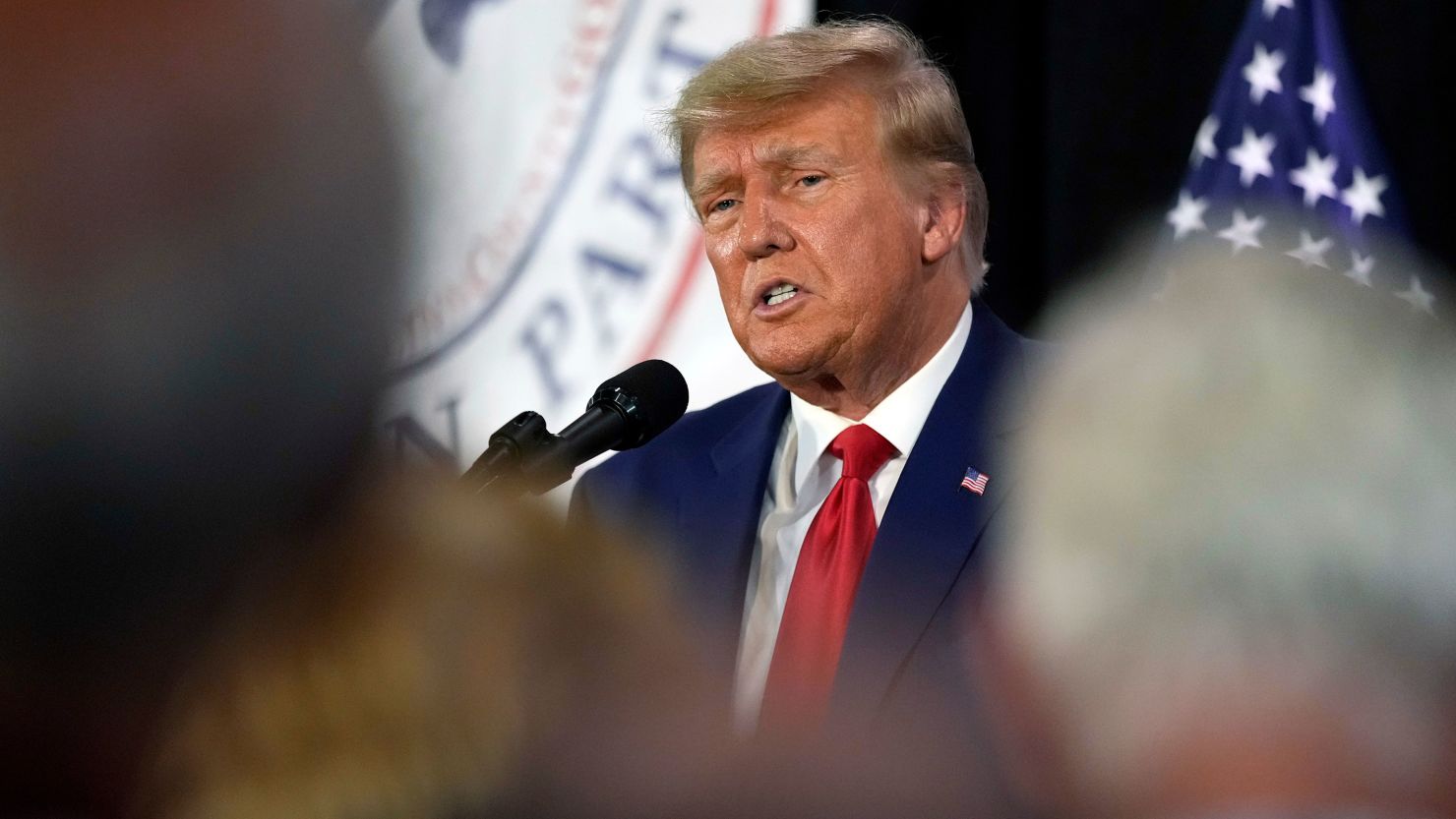 Former President Donald Trump visits with campaign volunteers at the Elks Lodge, July 18, 2023, in Cedar Rapids, Iowa.