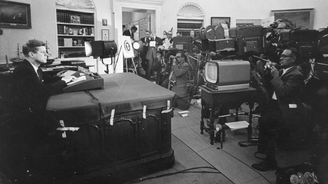 WASHINGTON - OCTOBER 22, 1962: U.S. President John F. Kennedy (L) speaks during a televised speech to the nation about the strategic blockade of Cuba, and his warning to the Soviet Union about missile sanctions, during the Cuban missile crisis October 24, 1962 in Washington, DC. Former Russian and U.S. officials attending a conference commemorating the 40th anniversary of the missile crisis October 2002 in Cuba, said that the world was closer to a nuclear conflict during the 1962 standoff between Cuba and the U.S., than governments were aware of. (Photo by Getty Images)