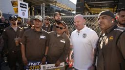 Sean M. O'Brien, Teamsters General President, center, greets UPS workers at a rally in downtown Los Angeles as a national strike deadline nears on Wednesday, July 19, 2023. A little more than a week after contract talks between UPS and the union representing 340,000 of its workers broke down, UPS said it will begin training nonunion employees in the U.S. to step in should there be a strike, which the union has vowed to do if no agreement is reached by the end of this month.