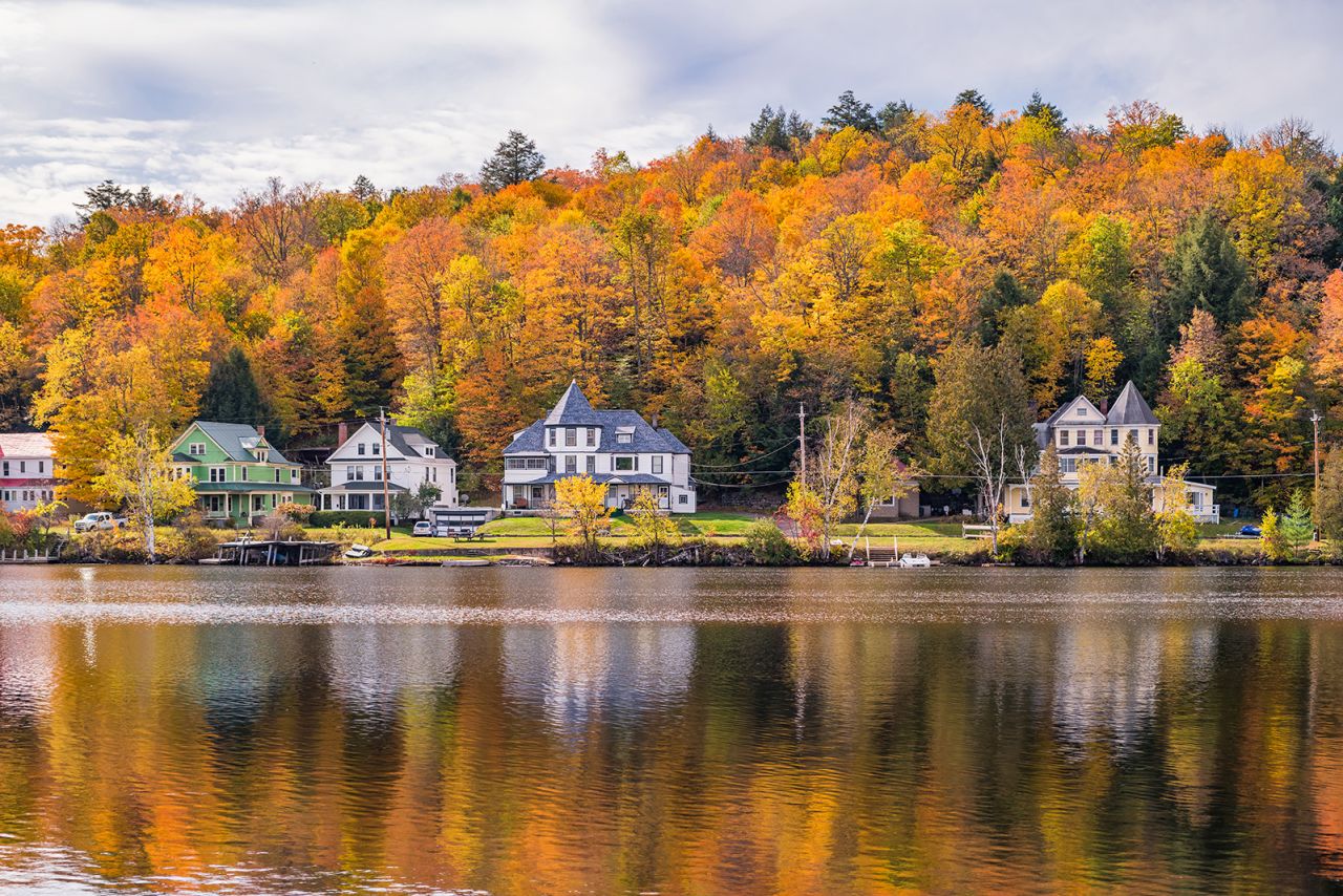 Houses in Saranac Lake in the Adirondack Mountains, New York State, USA, during Fall colors.