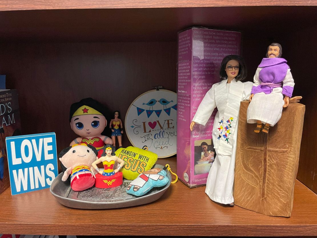 Shelf with Jesus, Pastor Barbara and Wonder Woman toys