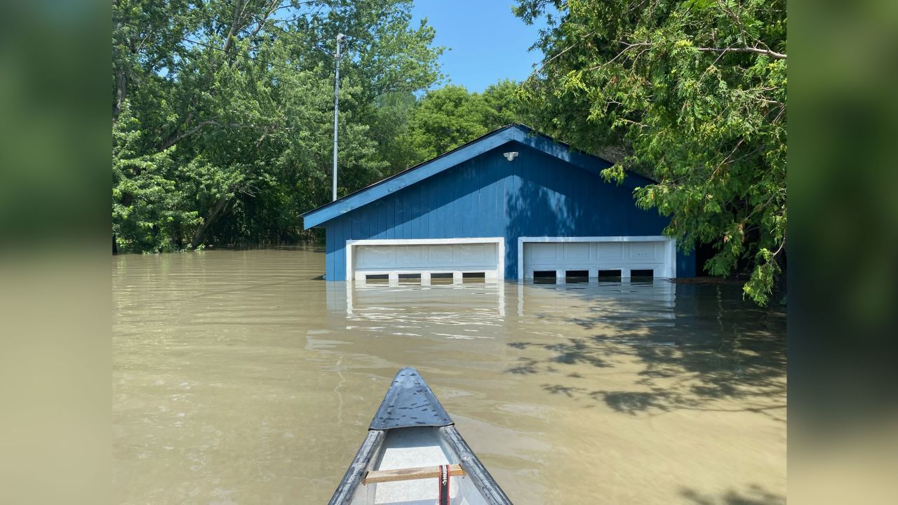 The flooded home was only accessible by boat at one point.