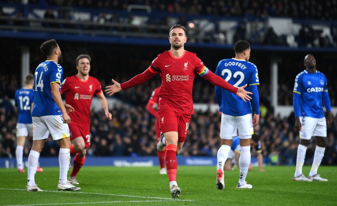 Jordan Henderson of Liverpool celebrates after scoring their side's first goal during the Premier League match between Everton and Liverpool at Goodison Park on December 01, 2021 in Liverpool, England.