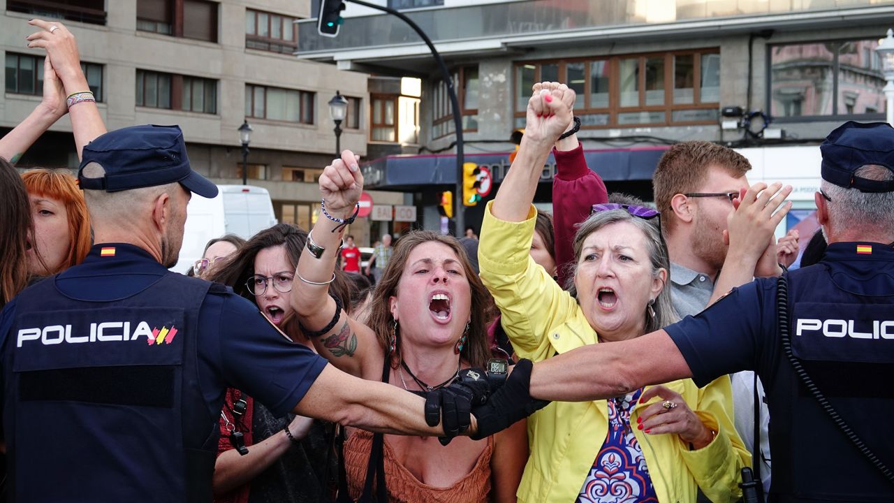Demonstrators protest a Vox event in Gijon on June 27.