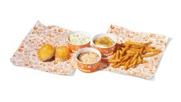 Popeyes take on the "Girl Dinner" trend with a menu including Southern dishes ranging from Mashed Potatoes with Cajun Gravy, Homestyle Mac & Cheese, Coleslaw, and Cajun Fries.