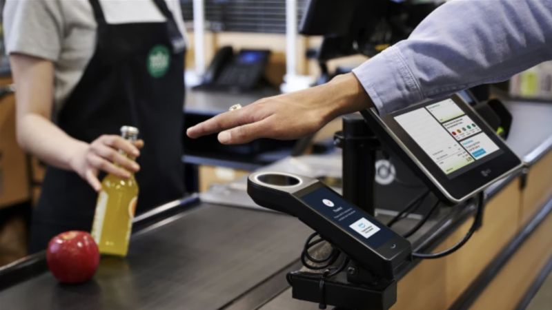 NextImg:Amazon will let you pay with a wave of your hand at all Whole Foods stores | CNN Business