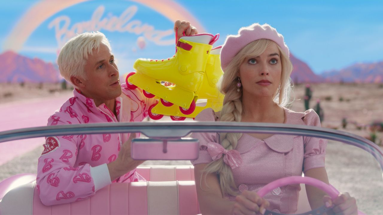 (L-r) RYAN GOSLING as Ken and MARGOT ROBBIE as Barbie in Warner Bros. Pictures' "BARBIE," a Warner Bros. Pictures release.