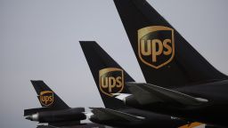 UPS logos on the tails of cargo jets parked at the UPS Worldport facility in Louisville, Kentucky, U.S., on Monday, Jan. 24, 2022. 