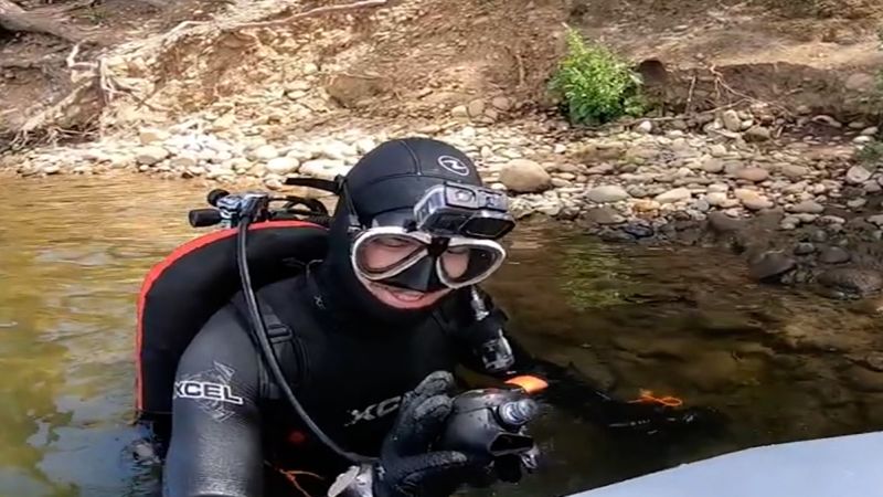 She lost her $9,500 wedding ring at bottom of lake. See how a diver found it | CNN